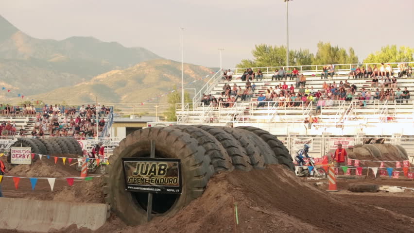 NEPHI, JUAB, UTAH 30 JUN 2012: Enduro motorcycle race tire bump jump. Juab County extreme enduro drawn visitors to rural community adding to needed economic stability. Difficult obstacle course.