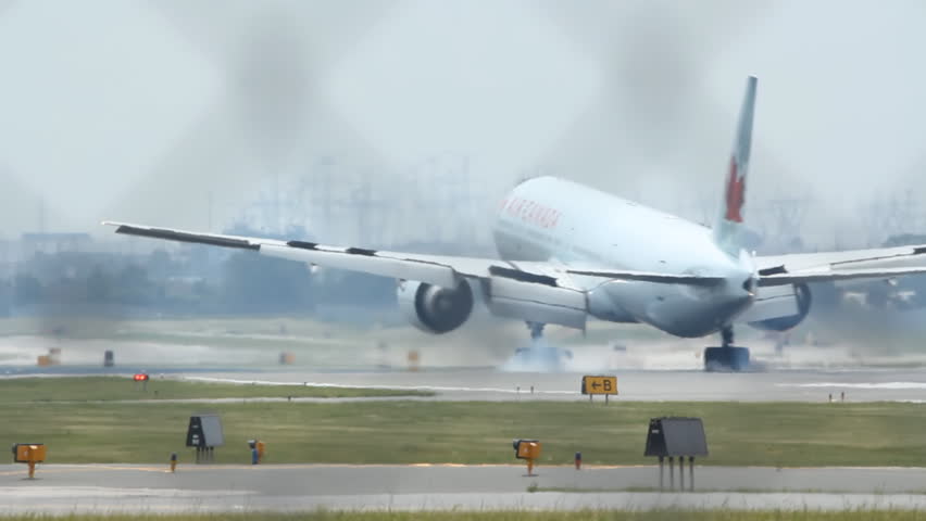Toronto, Ontario JUNE 18th: Jet landing at Pearson International airport in Toronto on June 18th, 2012. Pearson International is the busiest airport in Canada.