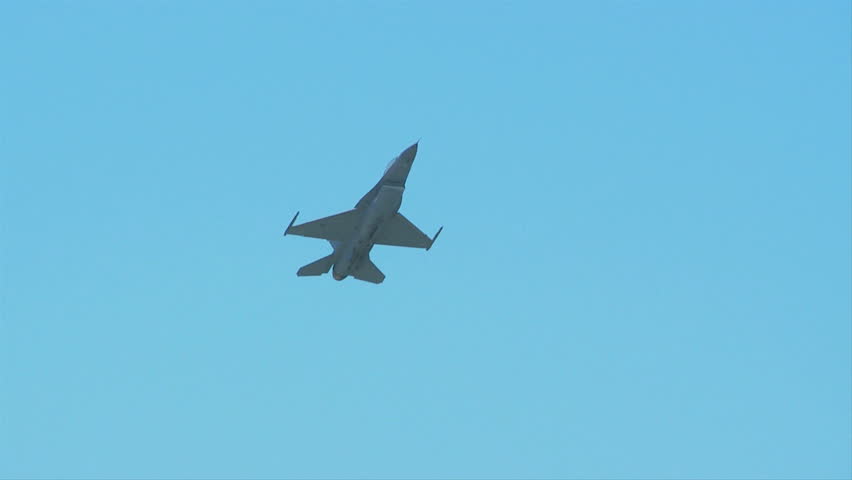 QUONSET, RHODE ISLAND - JUNE 2012: Air force F-16 Falcon flying directly overhead at the Rhode Island National Guard Open House and Air Show in June 2012.