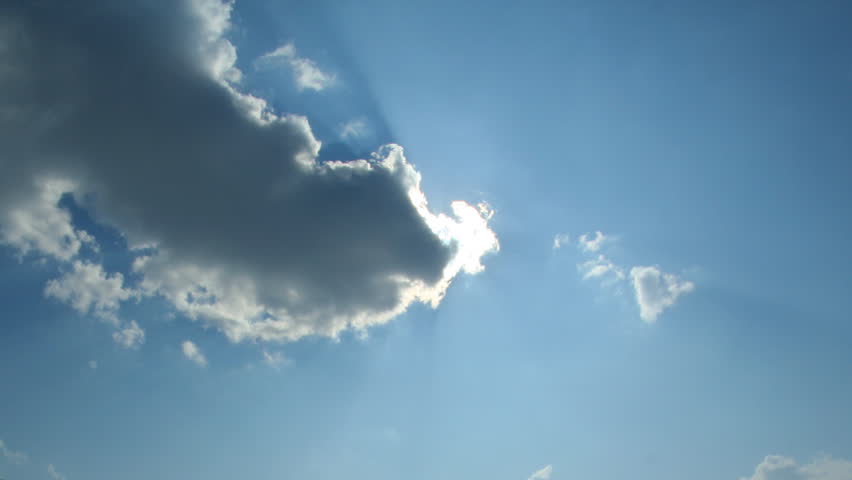Sun shining through the white clouds
