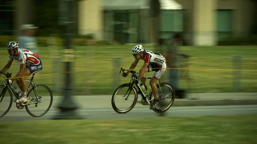 PROVIDENCE, RHODE ISLAND - SEPTEMBER 3, 2009: Bike racer passing camera