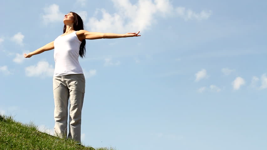 girl stretches in nature. 
