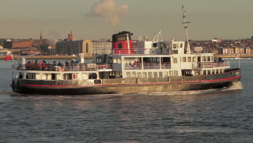 LIVERPOOL, MERSEYSIDE/ENGLAND - JANUARY 13: The Mersey ferry sails upriver along the River Mersey on January 13, 2012 in Liverpool. The ferry carries passengers between Liverpool and The Wirral.