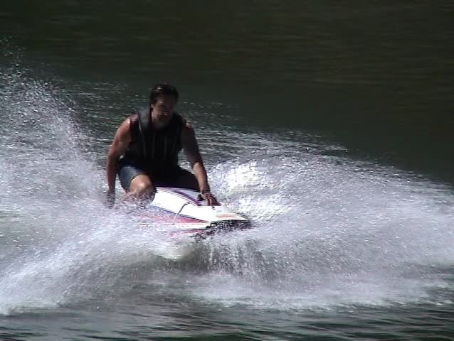 Man riding on his jet-ski in summer day