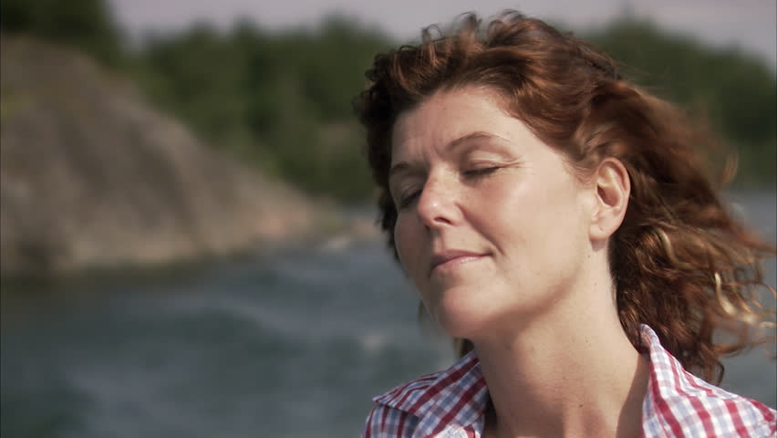 A woman going by boat