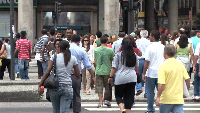 RIO DE JANEIRO, BRAZIL - CIRCA 2010: People Crossing A Very Busy Intersection in Rio De Janeiro, Brazil