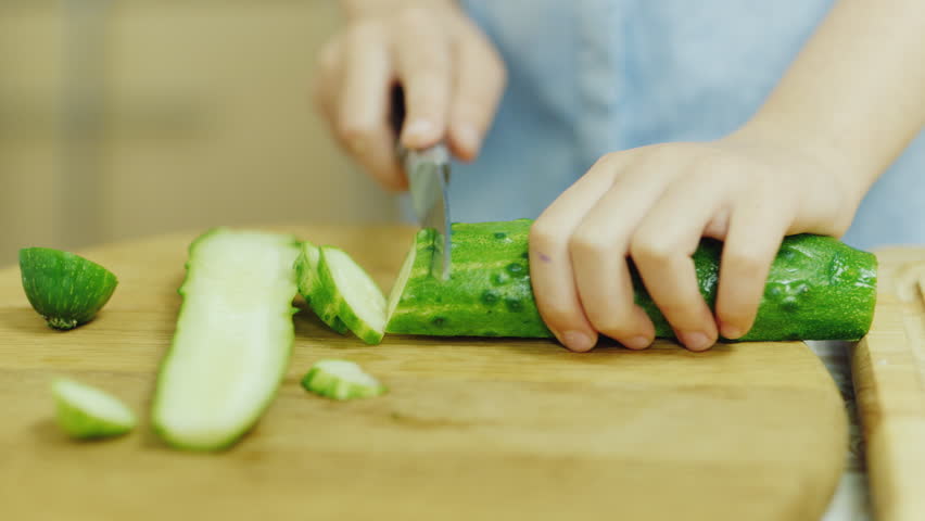 Kendall Cuts A Cucumber