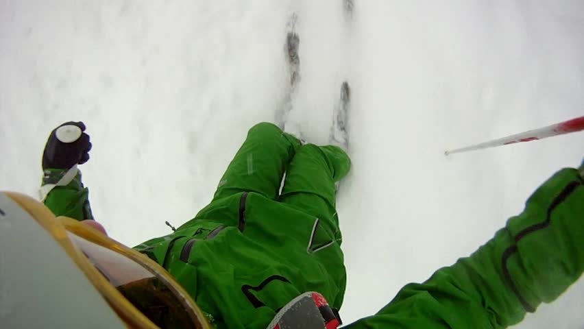 Ski sport man downhill at winter with slow motion