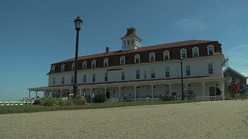 BLOCK ISLAND, RHODE ISLAND - CIRCA JULY 2010: Bicycle passing in front of Atlantic Inn on Block Island