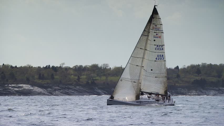 NEWPORT, RHODE ISLAND - CIRCA SEPTEMBER 2010: Sailboat moving fast in Narragansett Bay