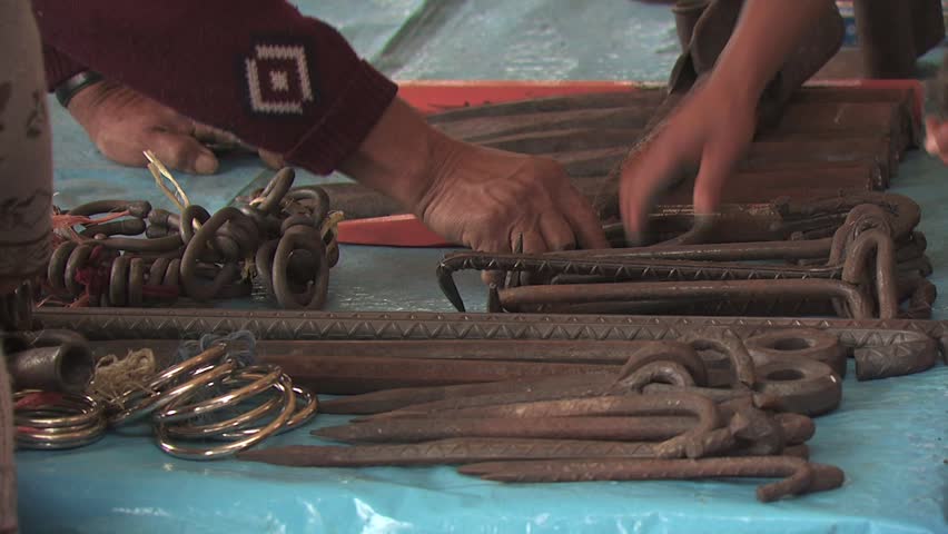 MEXICO CITY - CIRCA 2010: Mexican Vendors Set Up Merchandise 