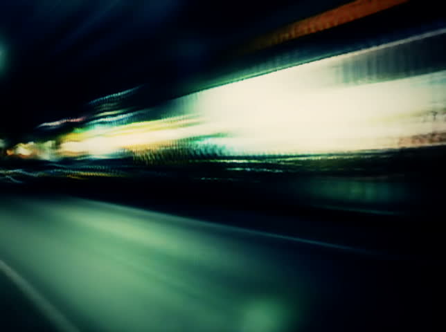 NTSC - Night lights streak as we travel down a city street (Loop).

Formats available: HD-NTSC-PAL