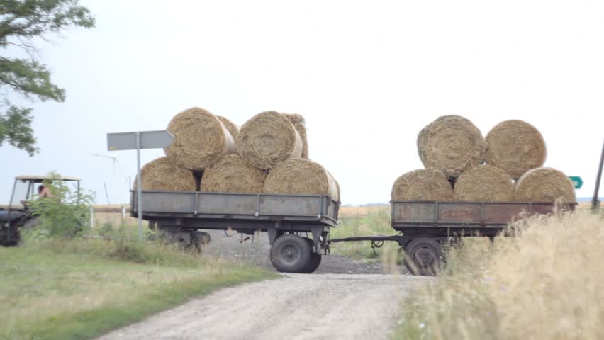 Tractor with bales of hay