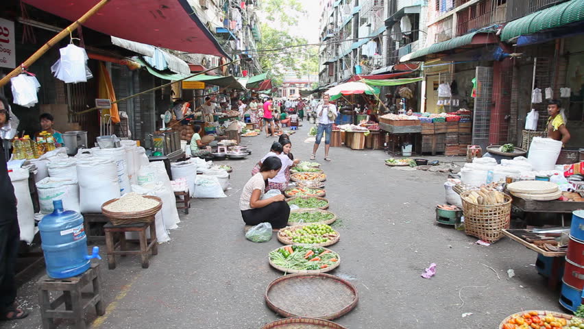 YANGON, MYANMAR - APRIL 28: Street market in Yangon activity on April 28, 2012 in Yangon. Yangon is the capital city of Myanmar.