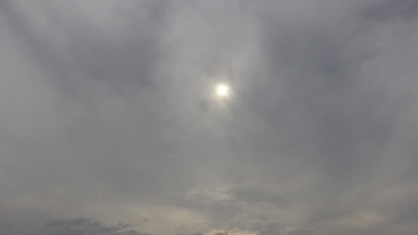Sun disk through density cloudscape