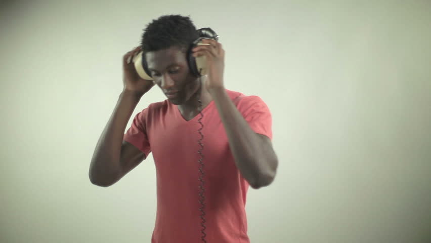 young african guy waving and dancing with a cool attitude