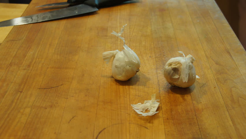 Time lapse: Salad prep - smash, peel and dice garlic cloves; slice mushrooms
