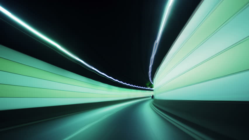 Tunnel to the unknown..., time lapse. Cars driving through a tunnel.