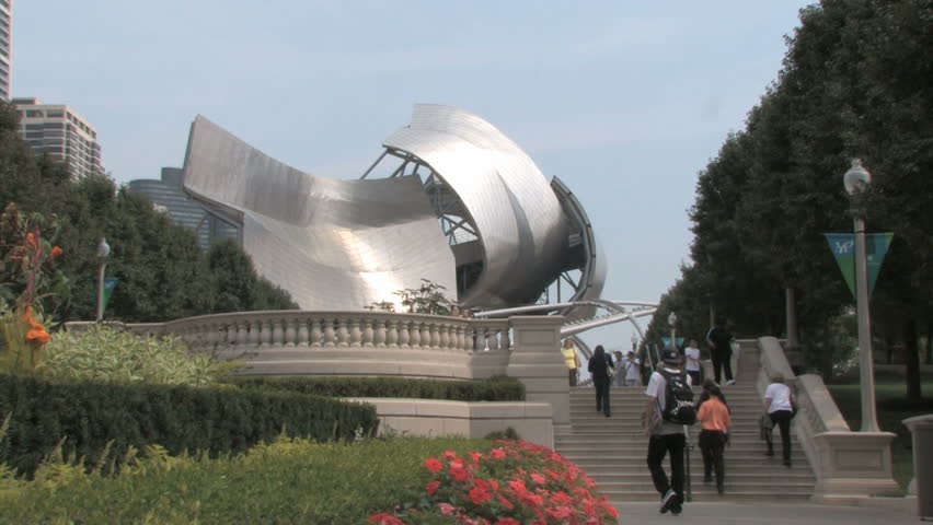 CHICAGO, USA - SEP 22, 2008: Millenium Park and traffic with passing cars and people in Chicago