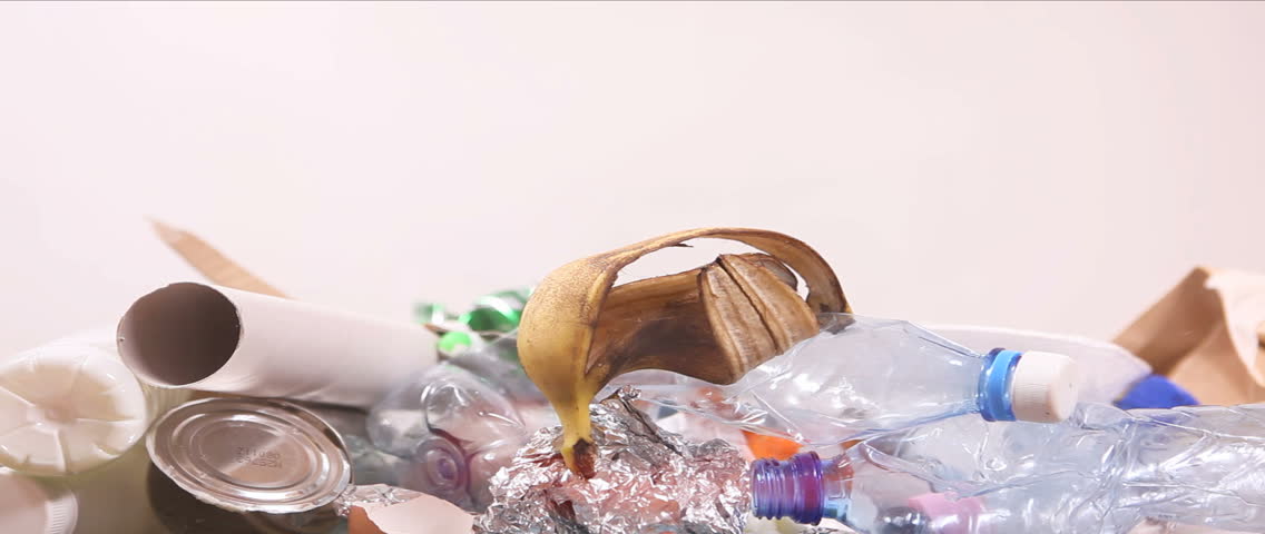 Pollution concept, trash falling down