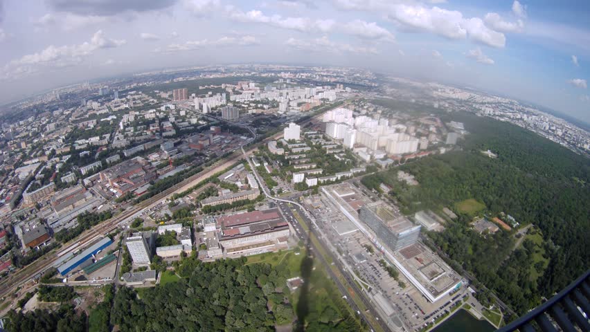 All-Russia exhibition center is visible from Ostankinsky television tower in afternoon, time lapse