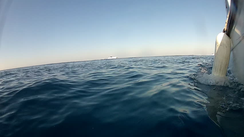 Boat and buoy
Boat sailing on the blue sea
