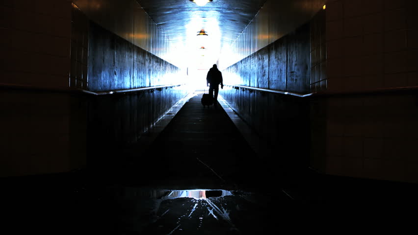 Passenger walking through spiritual tunnel