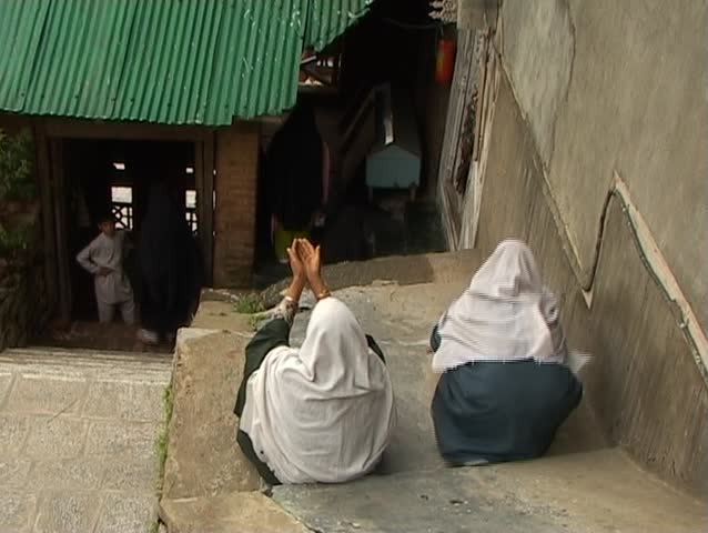 Muslim woman praying (Kashmir)