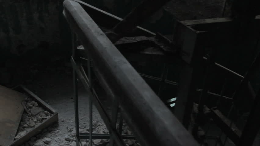Descent on a dark terrible ladder in the destroyed mystical house
