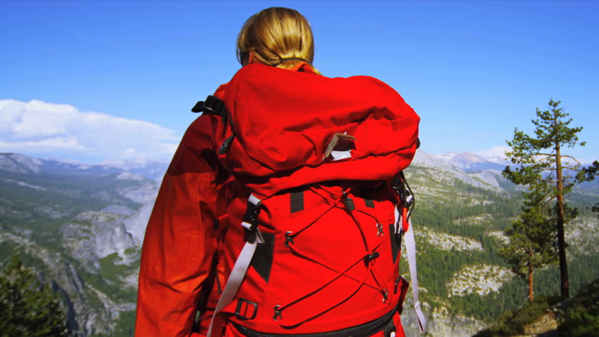 Female enjoying the satisfaction of achieving her ambitions, Yosemite, National Park, USA, Shot on Red Epic