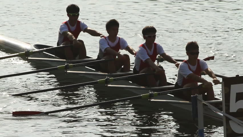 HONG KONG - NOVEMBER 5: Slow motion of men's four rowing team in racing contest on November 5, 2011 in Hong Kong, China.