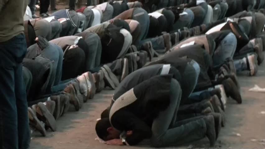 CAIRO, EGYPT â CIRCA DEC 2011: Muslim are praying in Tahrir Square during the clashes
circa December in Cairo, Egypt.