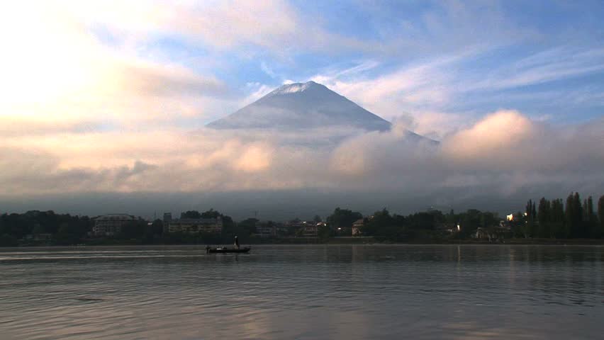 Mount Fuji with fisher in the morning from Lake Kawaguchi