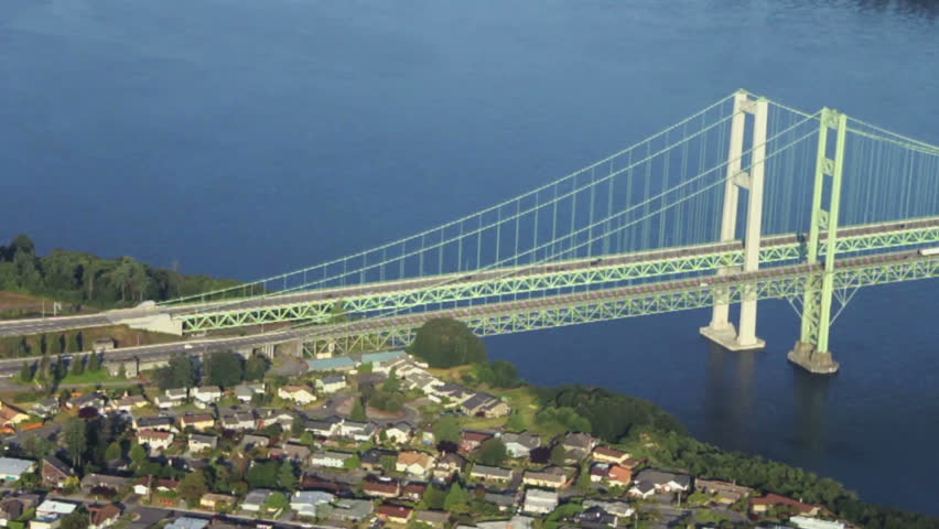 Perspective from the air of interstate bridge spanning across canal