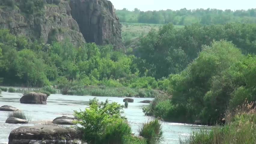 Water flowing over boulders