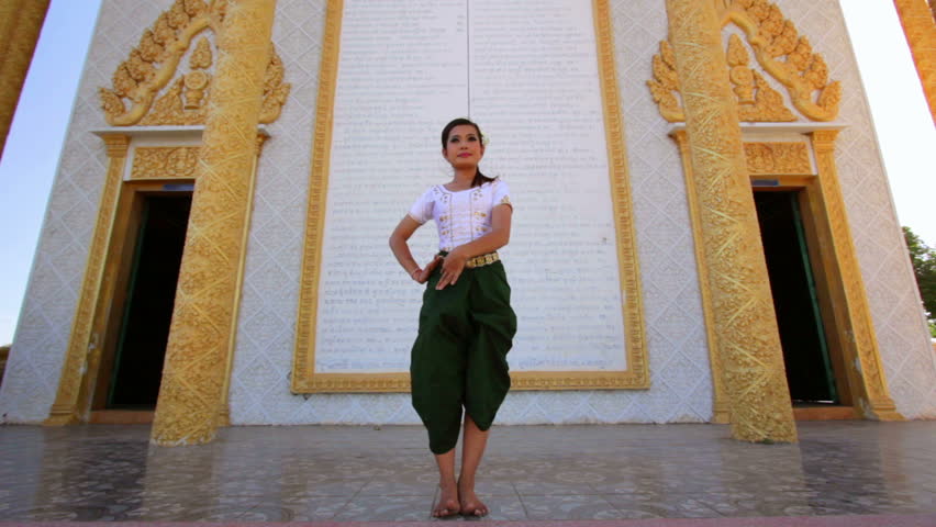 Beautiful Asian Girl performs Cambodian folk dance in temple
