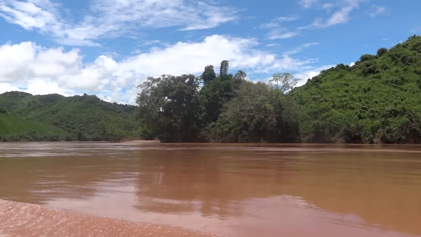NAM OU RIVER - AUGUST 16: River cruise from Nong Khiaw to Luang Prabang August 16, 2012 in Nam Ou river, Laos.