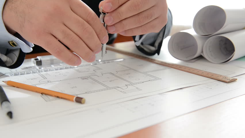 Architect does measuring on a draft. Full HD