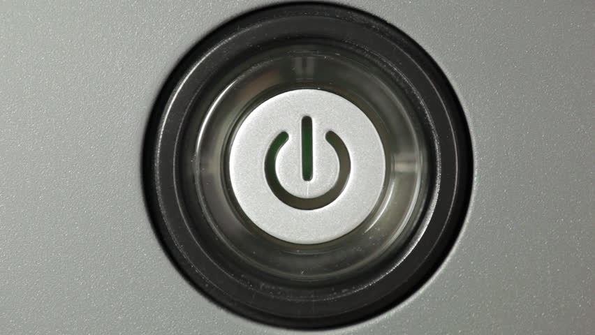 Press power button. Male index finger turning on a power button.
