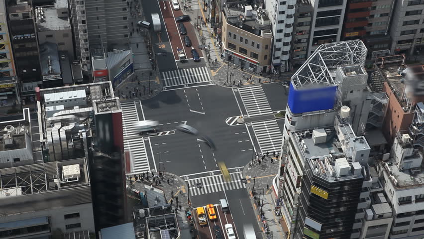 Aerial View of Tokyo Intersection, Japan, Commute, Crossroad, Metropolitan Area, time lapse, Blurred Logos
