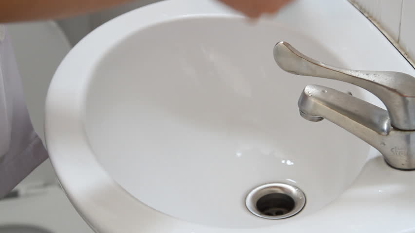 Washing hands with liquid soap , hand hygiene universal precaution