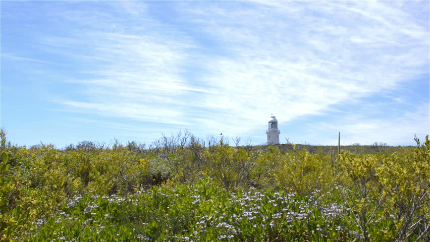 View of the Cape Naturaliste lighthouse, in the Leeuwin-Naturaliste National Park, in the South West of Western Australia. Tracking shot.