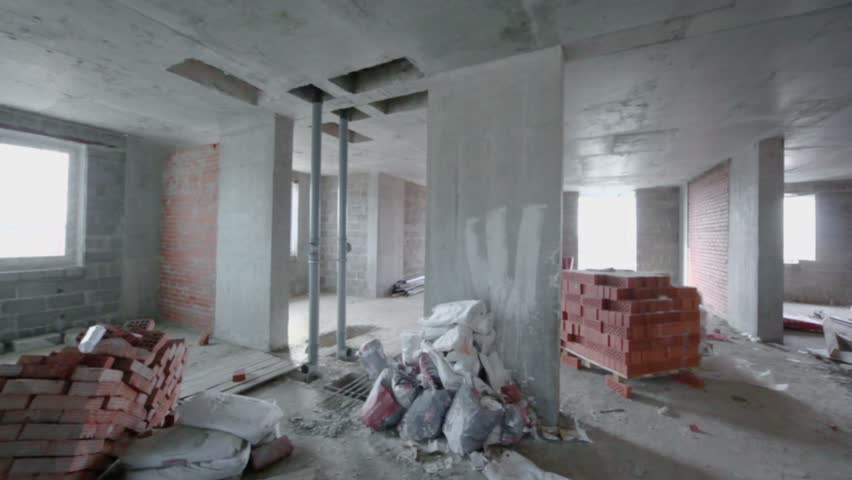Piping and building materials inside unfinished room