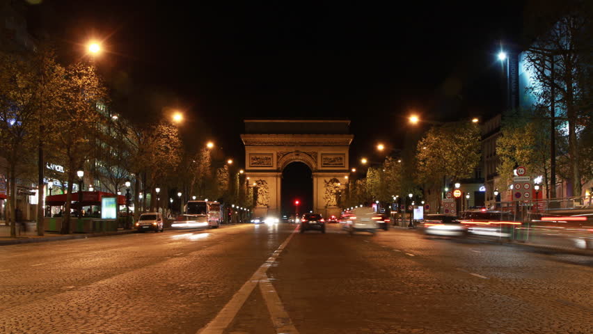 PARIS, FRANCE â APRIL 8th: Timelapse of Champs dâElysees with Arc de Triomphe in Paris on April 8th, 2012.