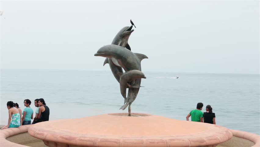 PUERTO VALLARTA, MEXICO - CIRCA NOV 2012: Malecon Friendship Fountain dolphin circa November 2012 in Puerto Vallarta, Mexico.