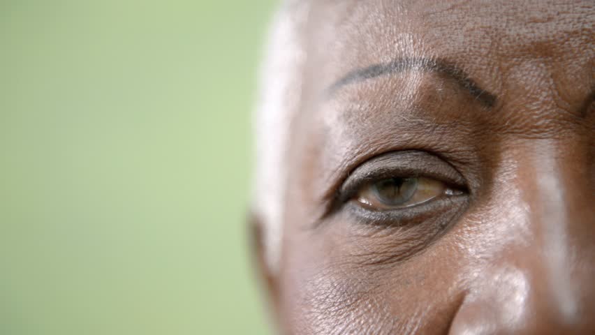 Senior black woman portrait, close-up of eye, mouth and face. Sequence