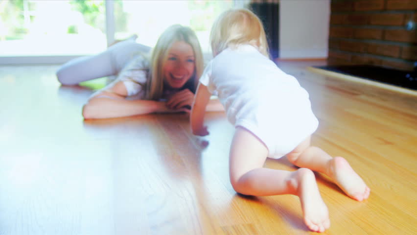 Smiling Baby Crawling Home Floor