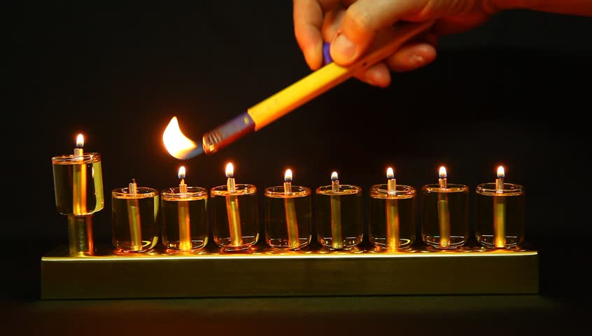 7 flames in Hanukia made of olive oil lanterns