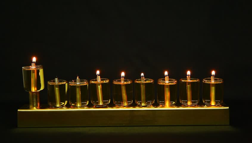 6 flames in Hanukia made of olive oil lanterns