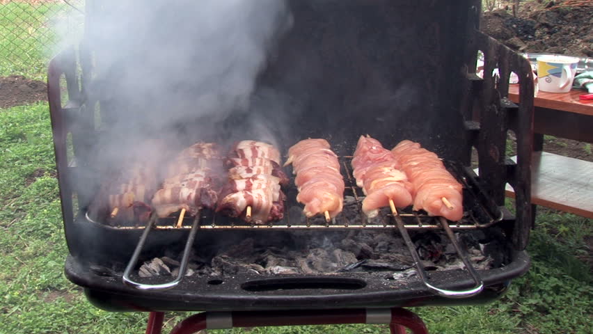 Barbecue cooked outdoors
